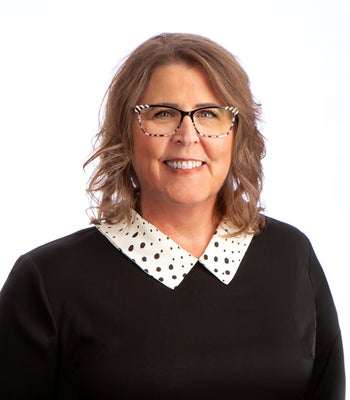 Portrait of Deb Cook, Realtor®.